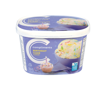  purple tub of Compliments Birthday Cake Flavour Light Ice Cream with a photograph of a birthday cupcake with a candle in it on front.