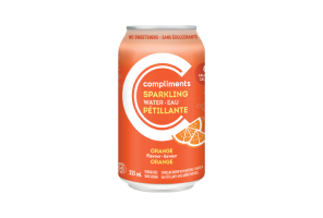 An orange tin can of Compliments Orange Flavour Sparkling Water.