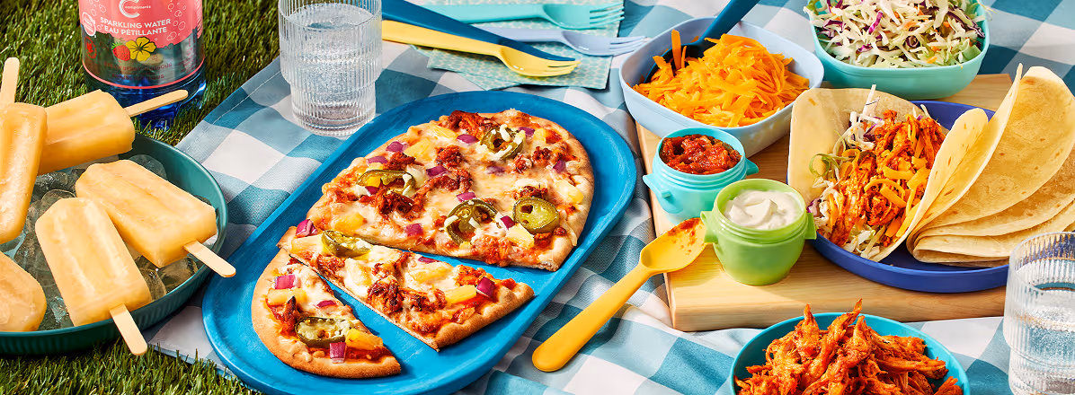 Al pastor picnic with flatbread, taco kit, pulled pork, and spicy margarita popsicles