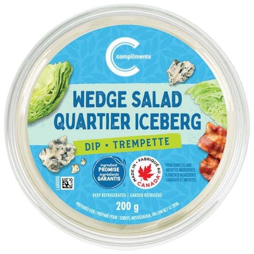 clear container of Compliments Caesar Salad Dip
