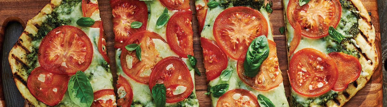 Grilled Tomato Pizza with Summer Greens Pesto