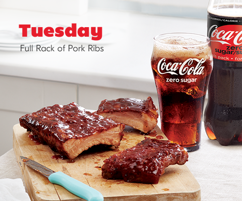 meal-3 Tuesday. Full Rack of Pork Ribs board shown with glass and bottle of coca-cola zero sugar