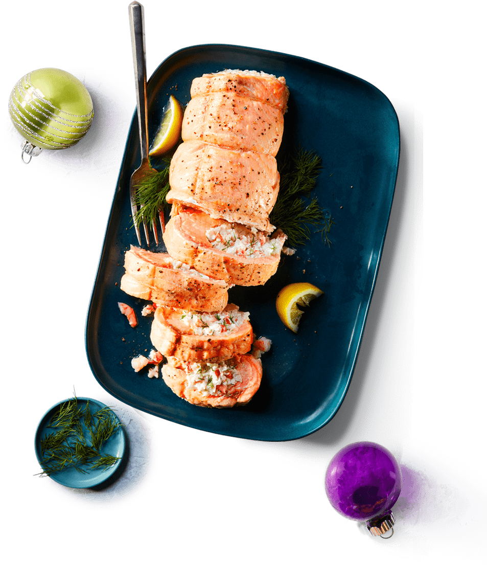 try-me_plattera Rolled roasted salmon on a blue platter.
