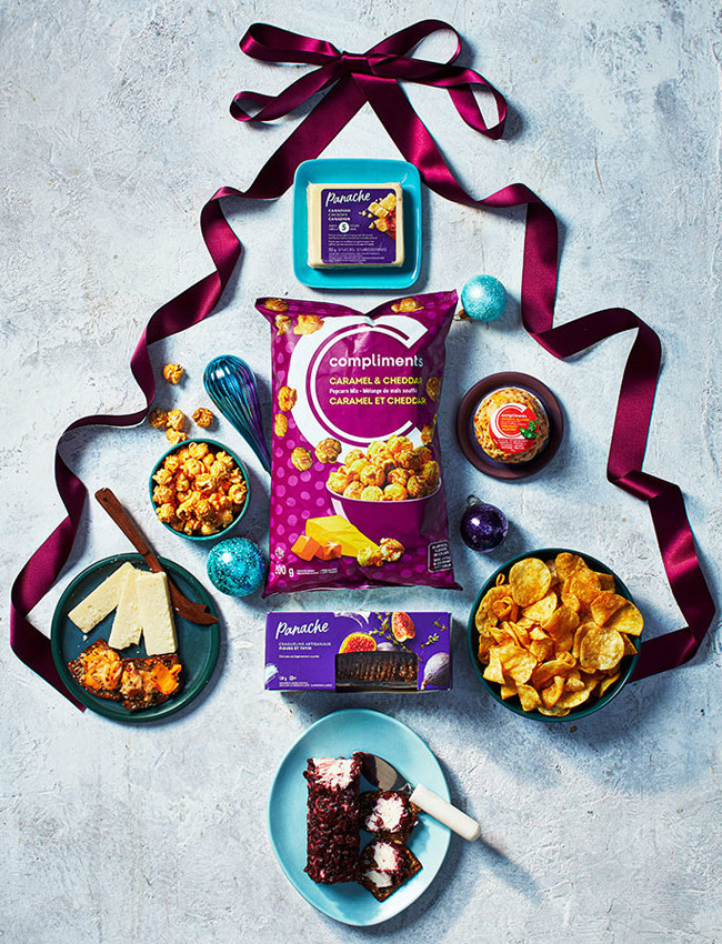 flat-lay of tasty snacks from kettle cooked potato chips to caramel and cheddar popcorn