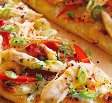 Chicken strips, veggies, and cheese–topped naan pizza.