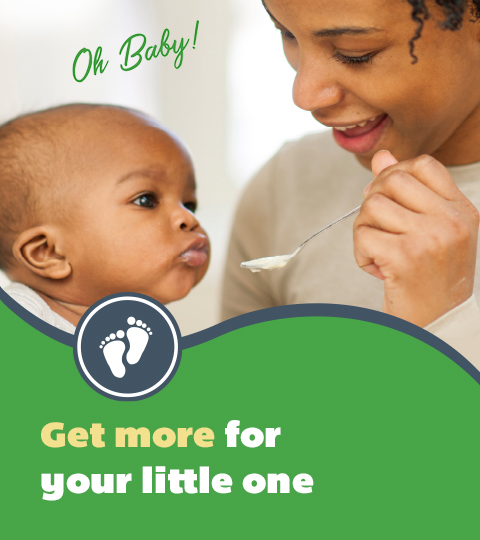 Parent spoonfeeding baby
