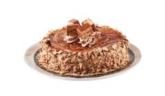 single_layer-cake-coffee_crisp Single layer cake topped with Coffee Crisp spread, chocolate whip and candy bar crumbs on a white plate.