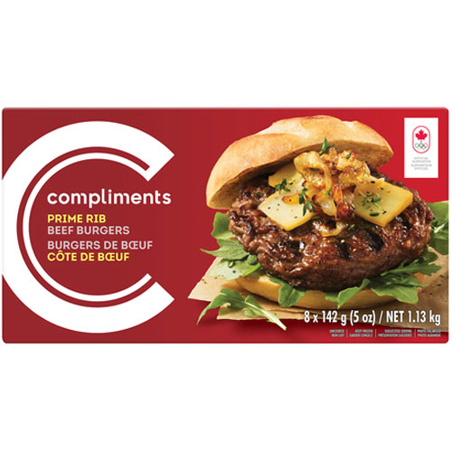 A fully dressed prime rib burger appears on a red Compliments Prime Rib Burger package.