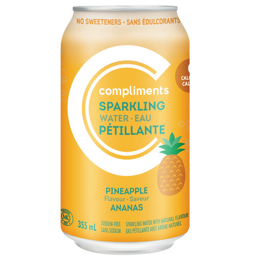 Clear plastic bottle of Compliments Pineapple sparkling water with a label on the front.