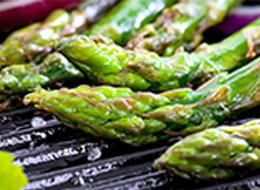 Close-up of asparagus on a grill.