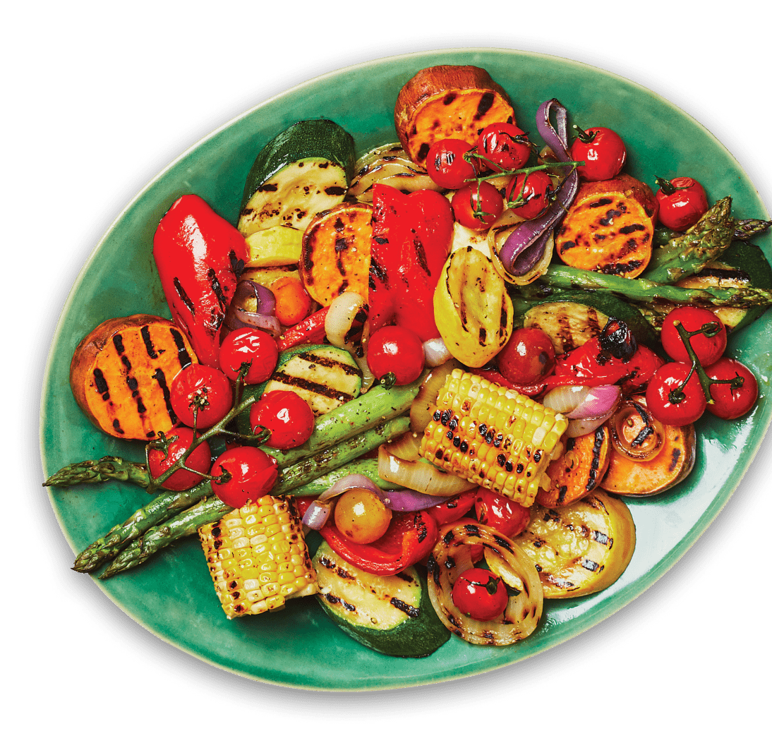 Grilled-vegetables Various grilled vegetables, including asparagus, corn, and zucchini, on a green platter.
