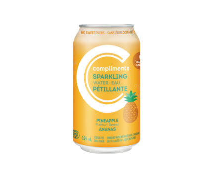 A 355 mL can of Compliments Pineapple Flavoured Sparkling Water with an orange coloured can containing a pineapple illustration on the front.