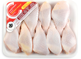Nine drumsticks in a white plastic tray with a cling wrap cover and a red Compliments label.
