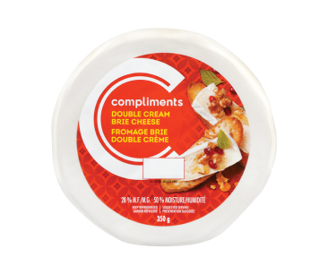 Red labelled wheel of Compliments Double Cream Brie.
