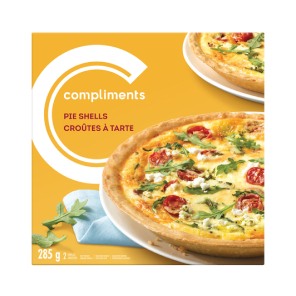 Yellow Compliments pie shell package with a photo on the front.