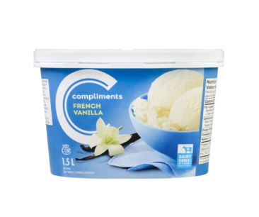 White tub with blue label of Compliments Vanilla ice cream.

