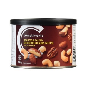 Brown wrapped tin of Compliments Roasted & Salted Deluxe Mixed nuts with a photo of the nut mix on the label.