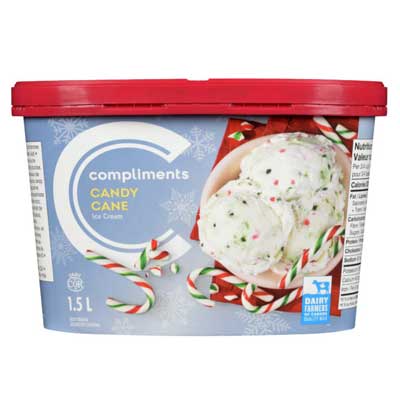 blue tub of ice cream with photo of ice cream in pink bowl surrounded by whole candy canes 