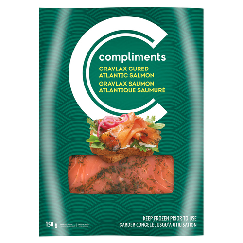 Cryovac sealed packet of Compliments Gravlax Cured Atlantic Salmon with a green label.
