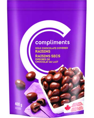 Purple pouch of milk chocolate covered raisins with a dish full on the front of package.