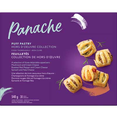 purple box with four puff pastries and herb sprigs