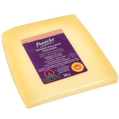 Square of Panache Asiago d’Allevo Mezzano DOP Cheese with a purple label.