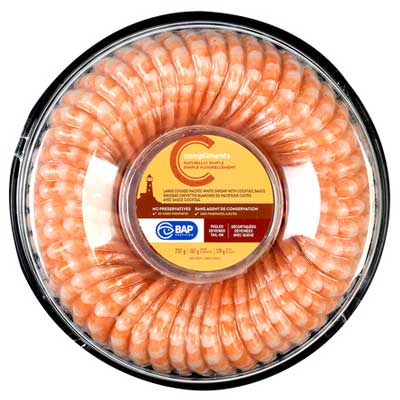 Clear carousel of Compliments Naturally Simple Shrimp Ring with cocktail sauce featuring a yellow label.