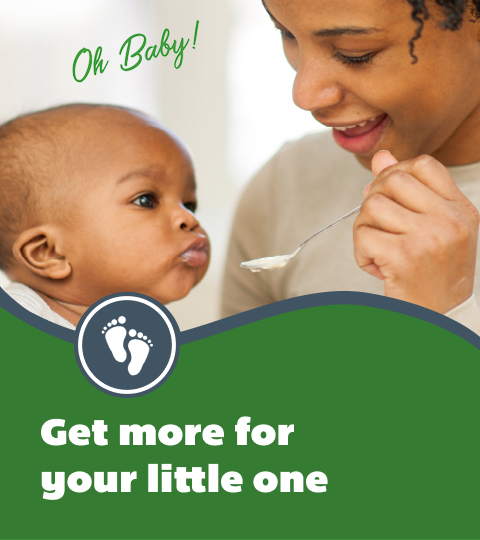 Parent spoonfeeding baby
