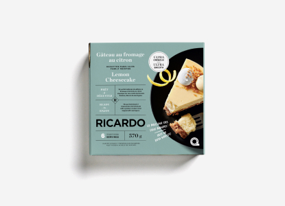 Light green Ricardo Lemon Cheesecake cardboard box package depicting the cake on the front.