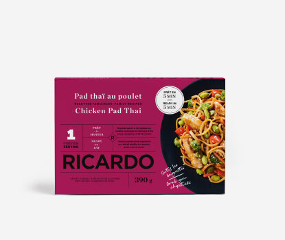 Magenta cardboard box with image of Chicken Pad Thai on black plate on front.