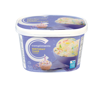 A light blue tub of Compliments Unicorn Twirl Ice Cream with an illustration of a little unicorn on the front.