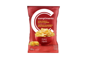 A red packet of Compliments Extra Crunchy Kettle-Cooked Potato Chips, featuring a red bowl of chips on the front.