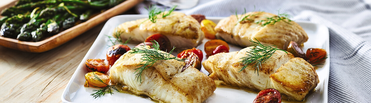 Grilled halibut steak with roasted peppers