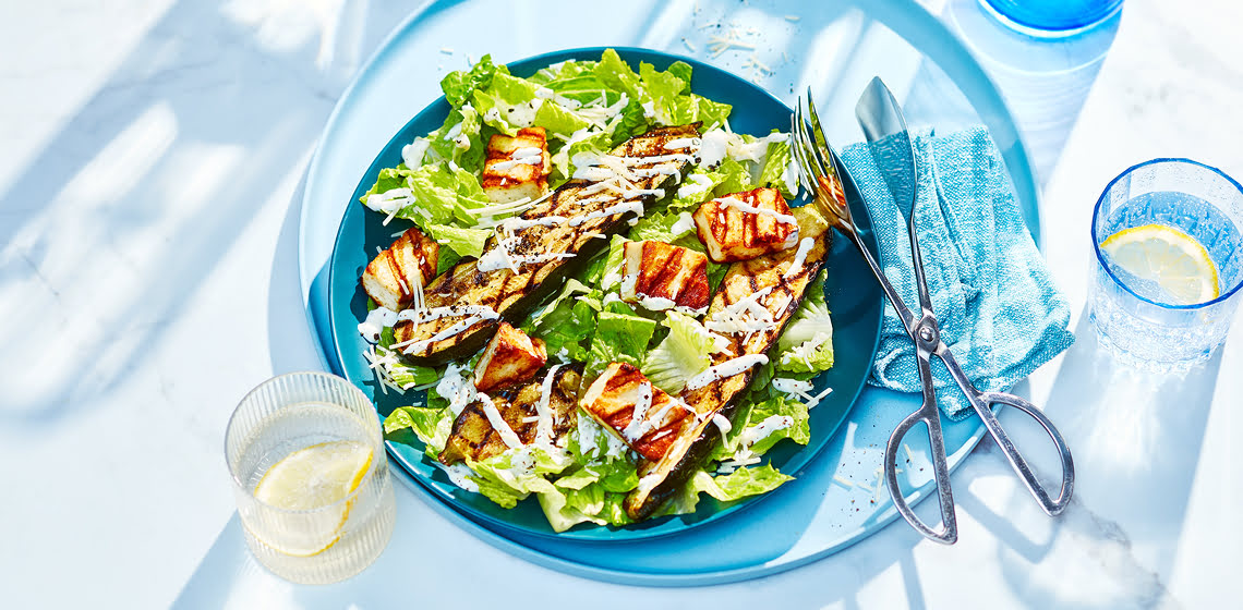 A platter of Grilled Zucchini Caesar Salad with Halloumi Cheese Croutons.