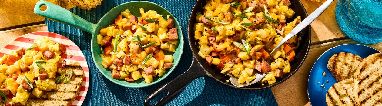 Campfire skillet breakfast with grilled bread on the side